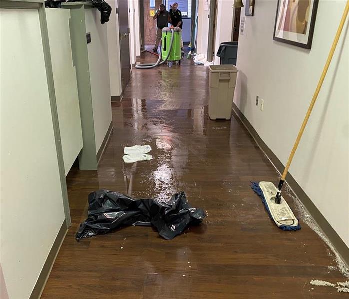 Commercial Hallway with standing water damage