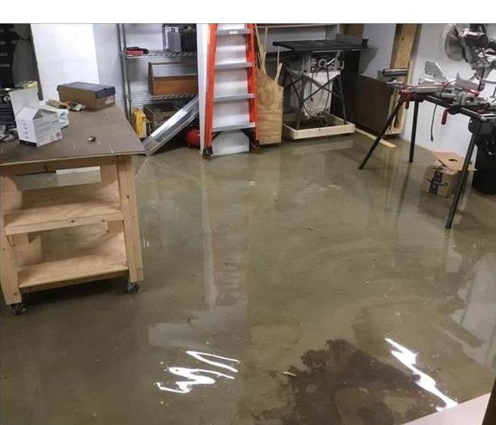Workshop floor with standing water
